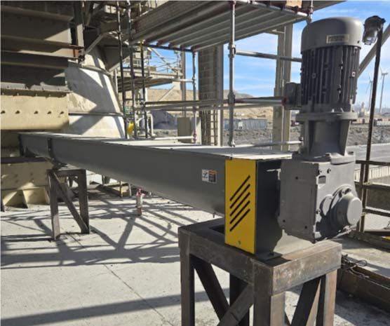 Industrial conveyor system with a motor installation requiring precise stainless steel pipe welding and fabrication